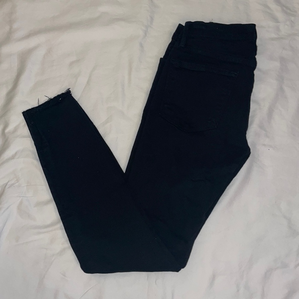 FRAME le skinny jeanne raw stagger jeans in film noir